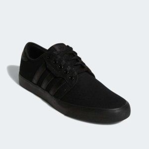 all black adidas skate shoes